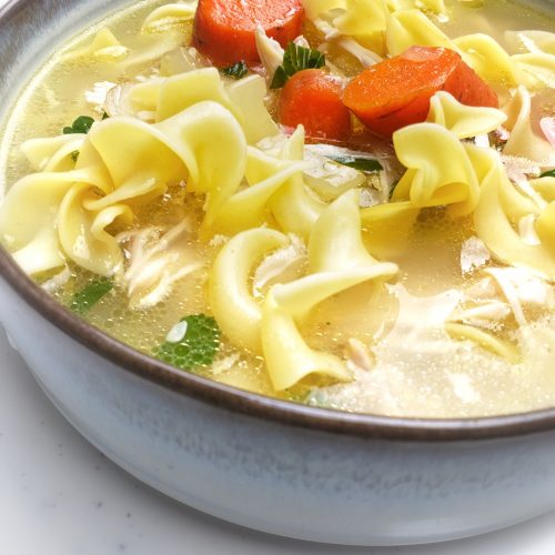 side image of chicken noodle soup