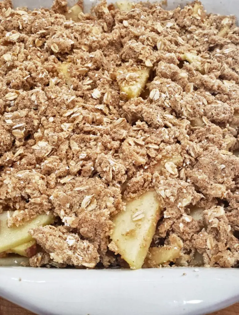 apple crisp in baking dish before baking