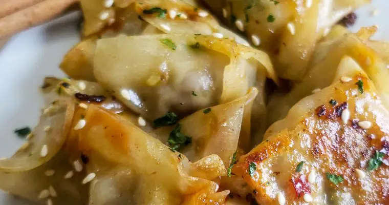 Ginger Pork and Brussels Sprout Potstickers with Sweet Chili Sauce