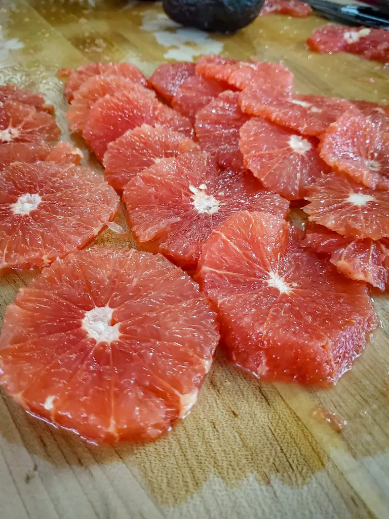 image of peeled and pithed ruby red grapefruit slices