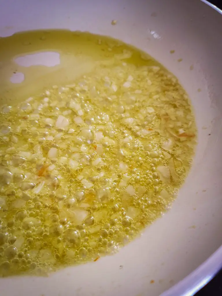 image of shallots sauteing in olive oil