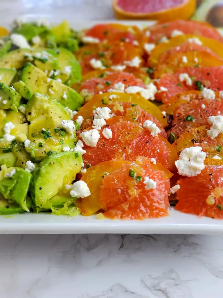 up close image of portion of RED GRAPEFRUIT, GOLDEN BEET AND AVOCADO SALAD
