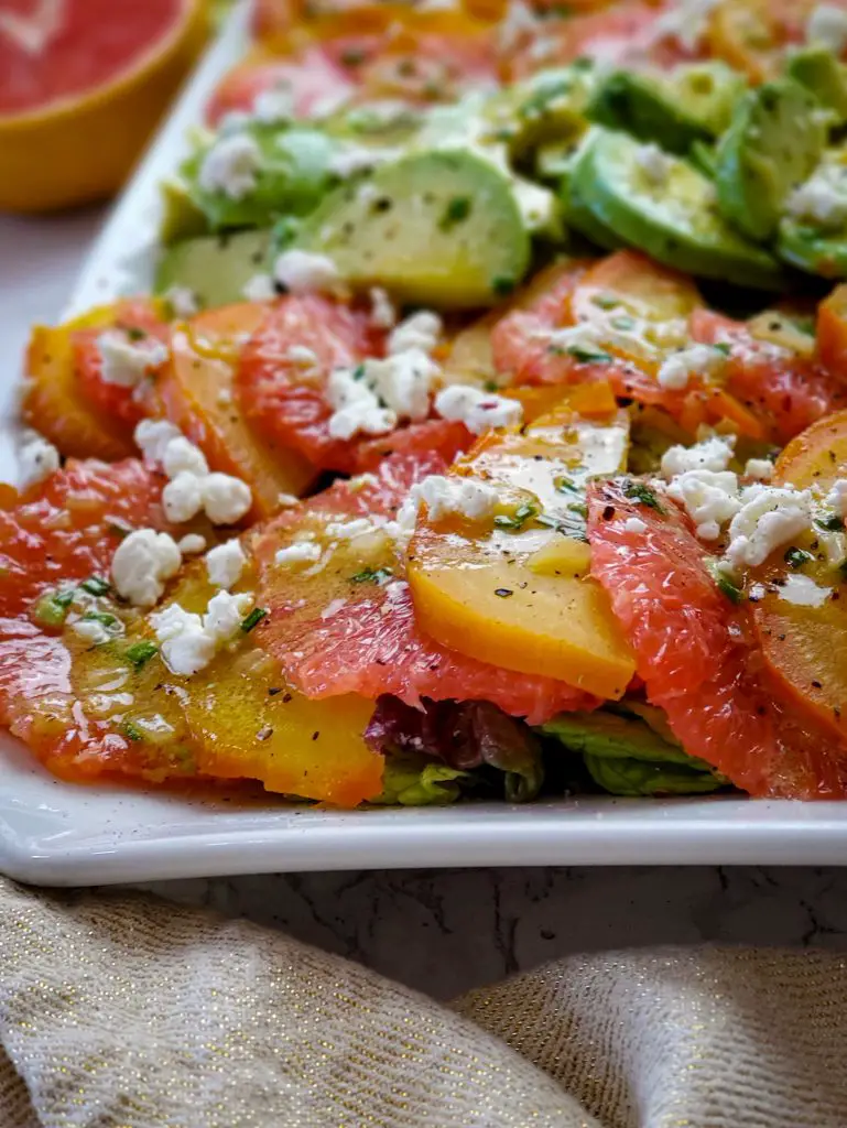natural light image of RED GRAPEFRUIT, GOLDEN BEET AND AVOCADO SALAD