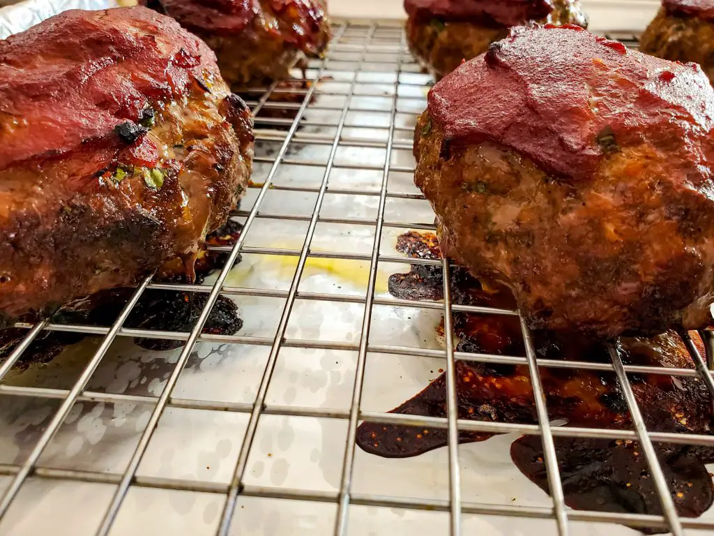image of mini meatloaf baked on baking sheet with rack