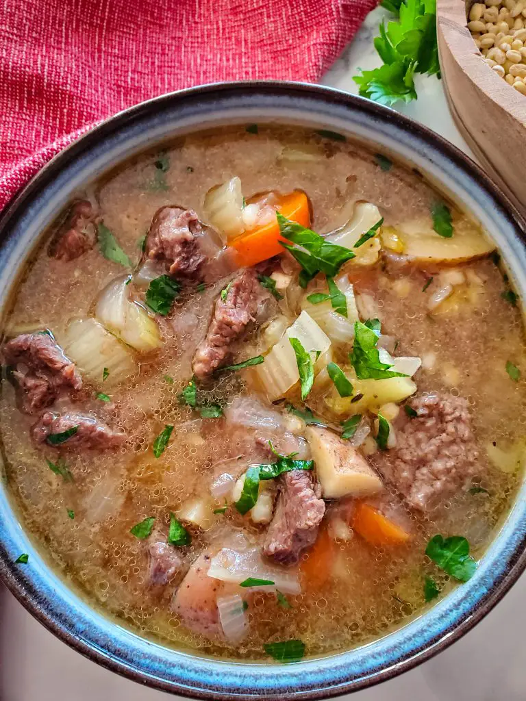 image of bowl of instant pot beef and barley soup