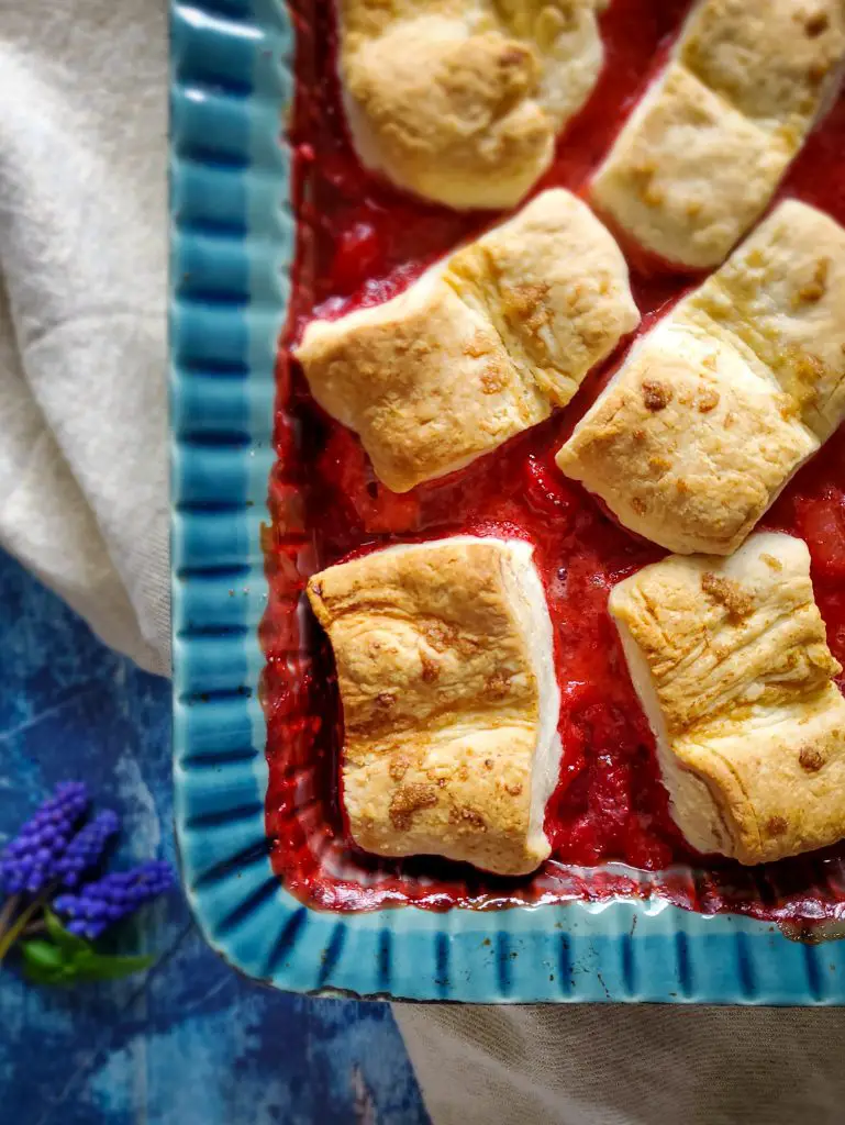 Basil & Bourbon Strawberry Cobbler with Cream Cheese Biscuits