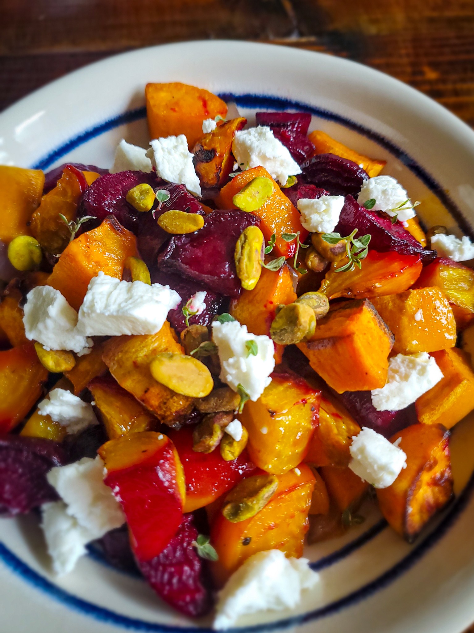 Roasted Beets & Sweets Potatoes are a match made in heaven! A drizzle of honey, crunchy pistachios, 