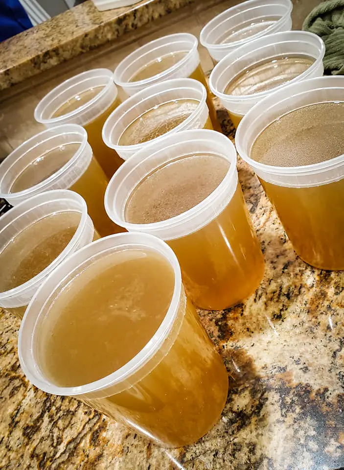 image of quarts of homemade chicken stock created in instant pot pressure cooker