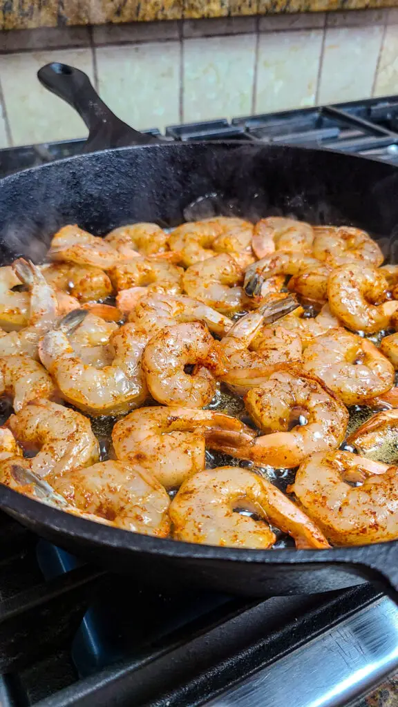 image of shrimp searing in cast iron skillet