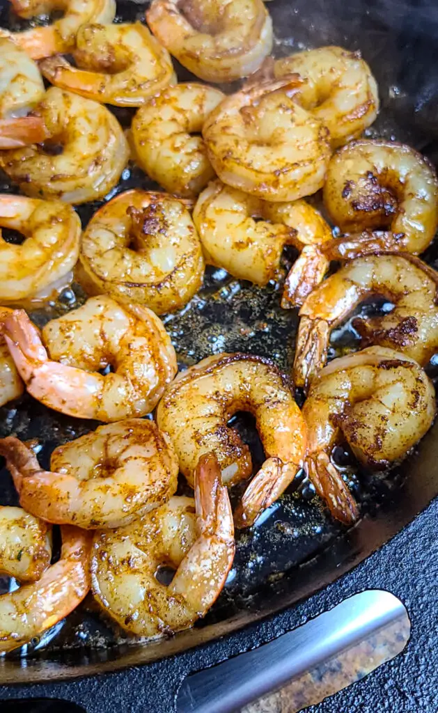 image of shrimp searing in cast iron skillet