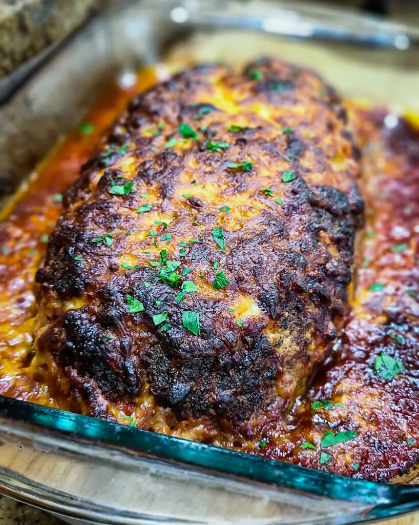 image of baked Italian style meatloaf with melted mozzarella cheese and marinara sauce 